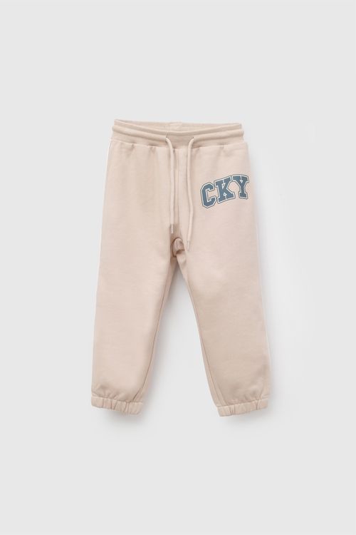 Pantalon buzo cky niño beige 6-9M a 4-5A